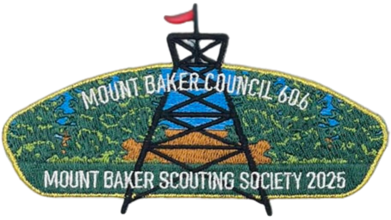 Council shoulder patch featuring Mount Baker Scouting Society text and a depiction of the Fire Watch Tower - gold border