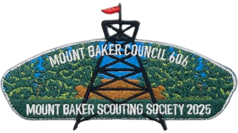 Council shoulder patch featuring Mount Baker Scouting Society text and a depiction of the Fire Watch Tower - silver border